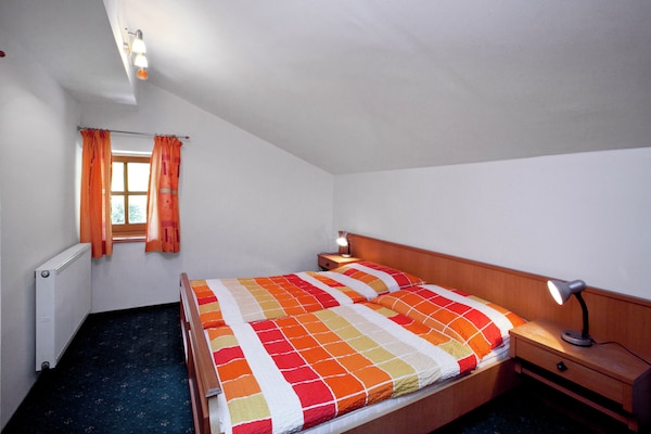 Foto van Boerderij: Alpenretraite met uitzicht op de bergen - BedRoom