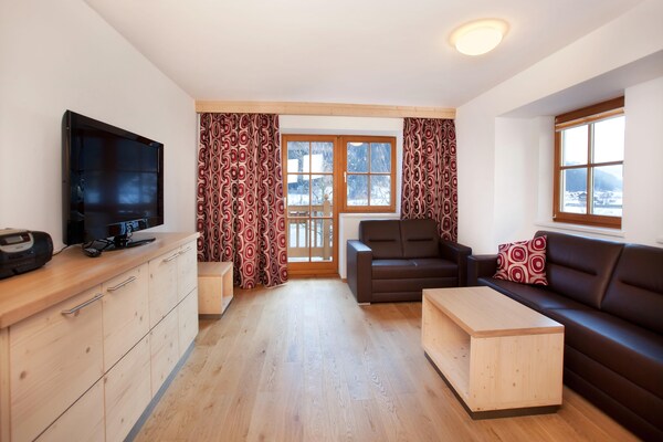 Foto van Appartement Wald im Pinzgau bij Skilift - Vakantiehuis in Wald im Pinzgau - LivingRoom