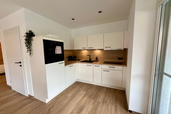 Foto van Appartement in Saalfelden met balkon en uitzicht op de bergen - Kitchen