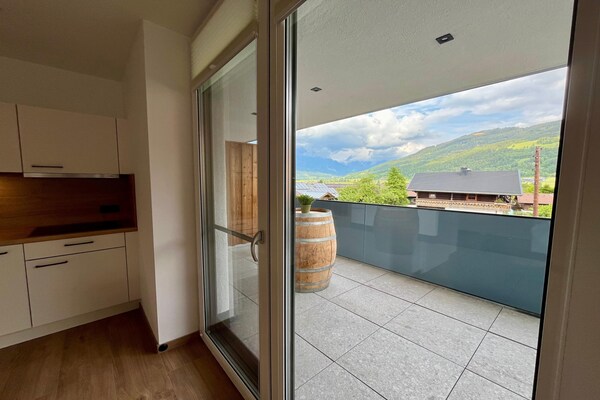 Foto van Appartement in Saalfelden met balkon en uitzicht op de bergen - TerraceBalcony