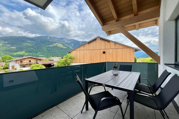Foto van Appartement in Saalfelden met balkon en uitzicht op de bergen - TerraceBalcony
