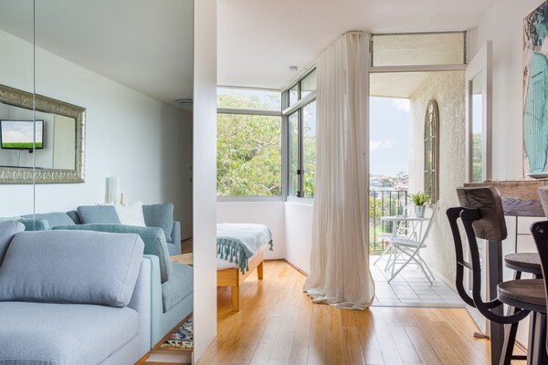 Foto van Bronte Beach kustappartement met uitzicht op de oceaan - LivingRoom