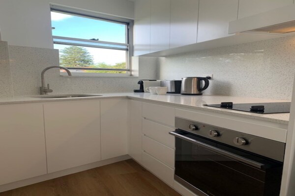 Foto van Bronte Beach kustappartement met uitzicht op de oceaan - Kitchen