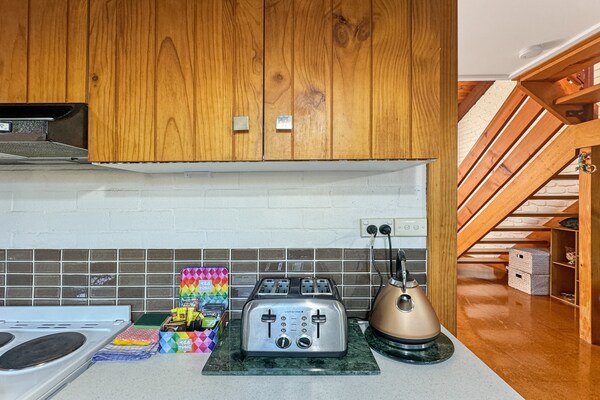 Foto van Broulee Break - Strandhuis met 2 slaapkamers en speelkamer - Kitchen