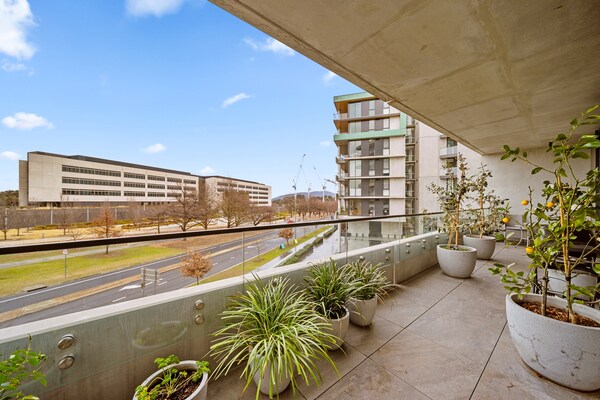 Foto van Binnenstadsappartement met 2 slaapkamers, groot balkon, tuin en fitnessruimte - TerraceBalcony