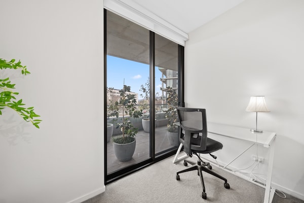 Foto van Binnenstadsappartement met 2 slaapkamers, groot balkon, tuin en fitnessruimte - BedRoom