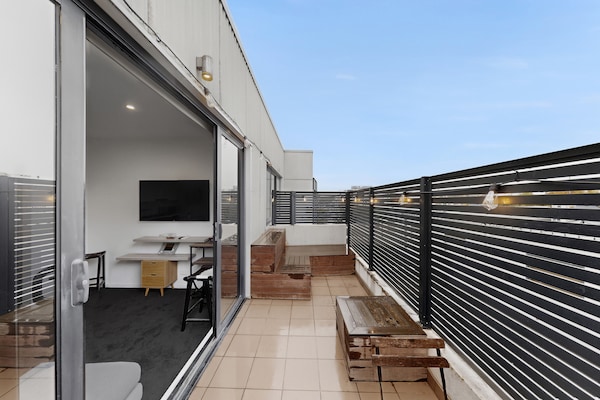 Foto van Appartement met 1 slaapkamer en uitzicht op de stad, vlakbij Central Park. - TerraceBalcony