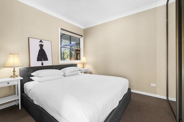 Foto van Botany Retreat: een apart appartement met 2 slaapkamers en een zwembad. - BedRoom