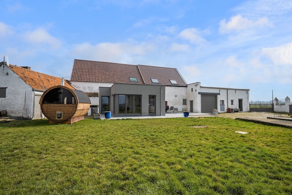 Foto van Charmant huisje met sauna - Vakantiehuis in Honnelles - ExteriorSummer