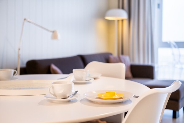 Foto van Appartement aan Belgische Kust met Uitzicht - Vakantiehuis in Oostduinkerke - DiningRoom