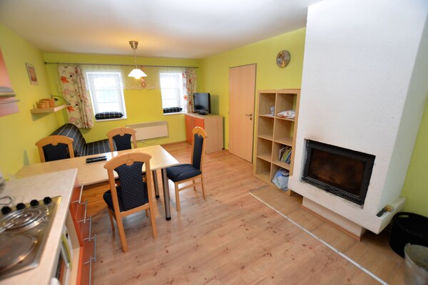 Foto van Vakantiehuis Medenec bij Alšovka Skibaan - Vakantiehuis in Měděnec - LivingRoom