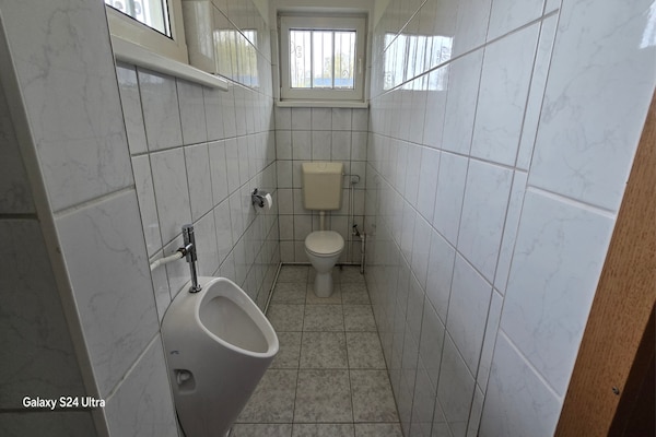 Foto van Bungalow in Schlowe aan het zie - Vakantiehuis in Borkow OT Schlowe - BathRoom
