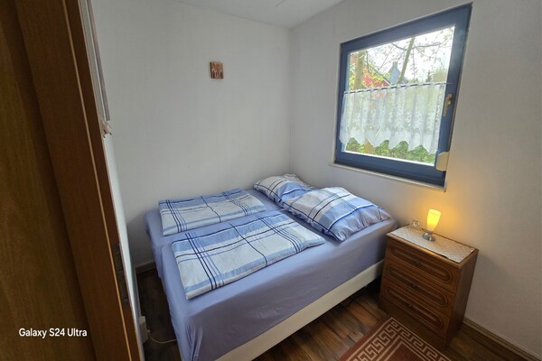 Foto van Bungalow in Schlowe aan het zie - Vakantiehuis in Borkow OT Schlowe - BedRoom