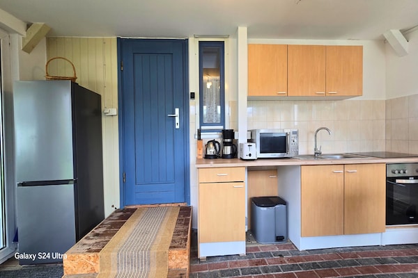 Foto van Bungalow in Schlowe aan het zie - Vakantiehuis in Borkow OT Schlowe - Kitchen