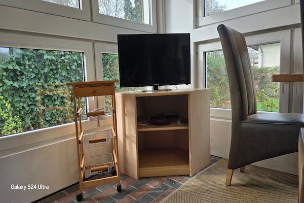 Foto van Bungalow in Schlowe aan het zie - Vakantiehuis in Borkow OT Schlowe - LivingRoom