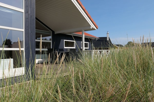 Foto van Beaside Wellness Chalet voor 10 personen - Vakantiehuis in Großenbrode - ExteriorSummer