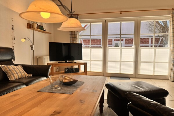 Foto van Vakantiehuis met open haard in Burhave - Vakantiehuis in Burhave - LivingRoom