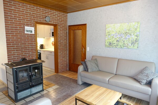 Foto van Feusdorf Bosbungalow - Vakantiehuis in Feusdorf - LivingRoom