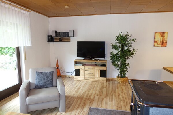 Foto van Feusdorf Bosbungalow - Vakantiehuis in Feusdorf - LivingRoom