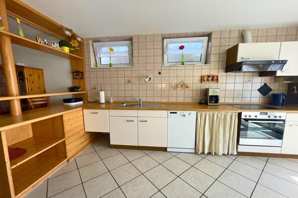 Foto van Vakantieappartement in herdersboerderij - Vakantiehuis in Olsdorf - Kitchen