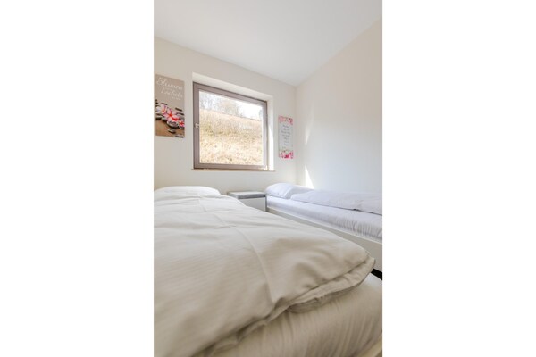 Foto van Bungalow im Campingpark - Vakantiehuis in Waxweiler - BedRoom