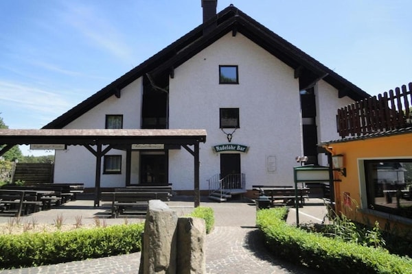 Foto van Belvilla Heiderhof Toegankelijke Tweepersoonskamer - HotelExteriorSummer