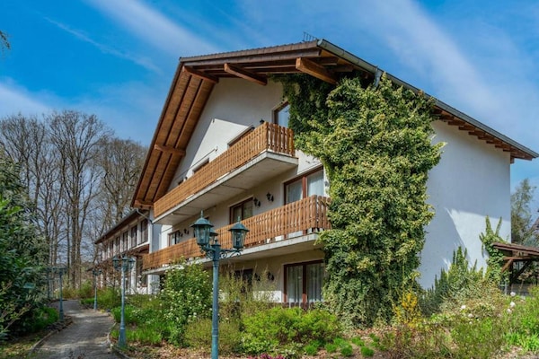 Foto van Belvilla Heiderhof Toegankelijke Tweepersoonskamer - HotelExteriorSummer
