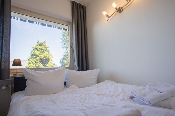 Foto van Modern appartement in hartje Winterberg met balkon - BedRoom