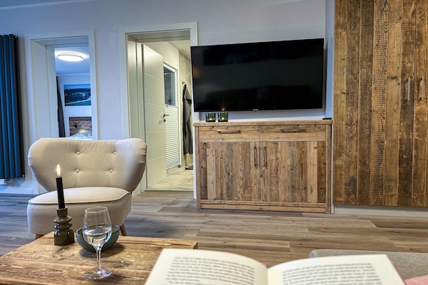 Foto van Modern appartement met balkon op de avonturenberg Kappe - LivingRoom