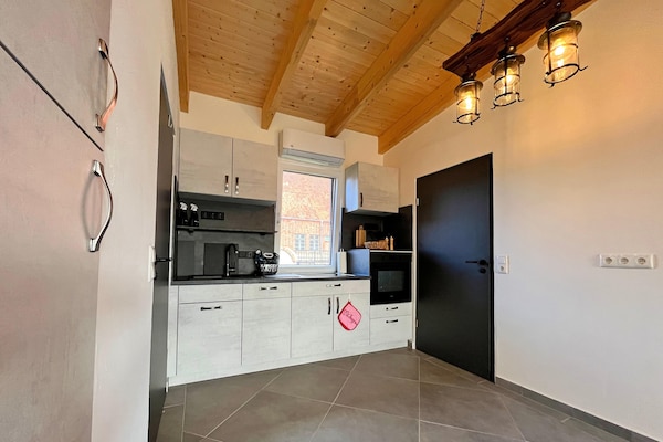 Foto van Vakantieappartement met eigen toegang tot het meer en een aanlegsteiger. - Kitchen