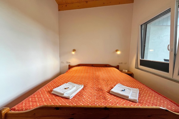 Foto van Vakantieappartement met eigen toegang tot het meer en een aanlegsteiger. - BedRoom