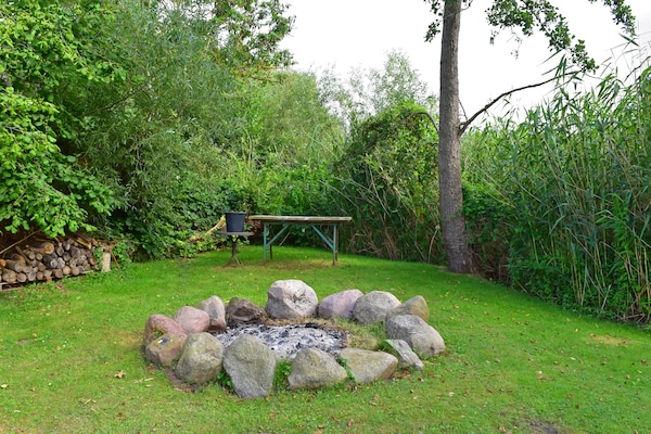 Foto van Vakantieappartement met eigen toegang tot het meer en een aanlegsteiger. - GardenSummer