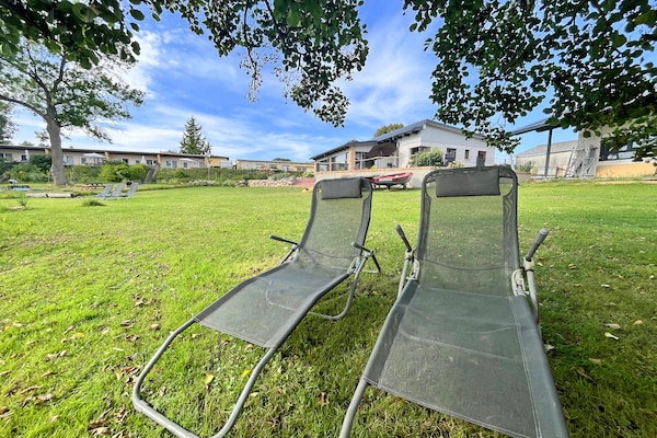 Foto van Vakantieappartement met eigen toegang tot het meer en een aanlegsteiger. - TerraceBalcony