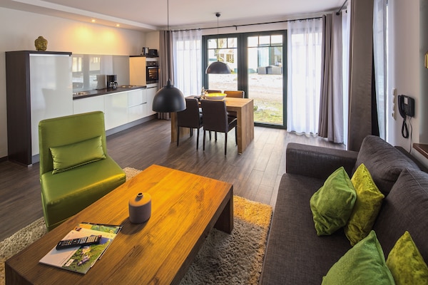 Foto van Twee-onder-een-kapwoningen in het natuurresort Drewitz - LivingRoom