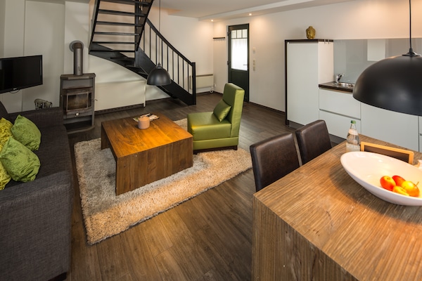 Foto van Twee-onder-een-kapwoningen in het natuurresort Drewitz - LivingRoom