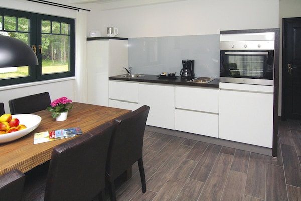 Foto van Twee-onder-een-kapwoningen in het natuurresort Drewitz - Kitchen