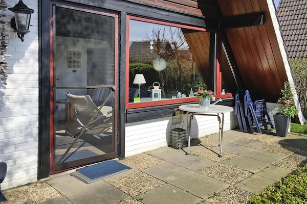 Foto van Vakantiehuis in Burhave vlakbij de zee - Vakantiehuis in Burhave - ExteriorSummer