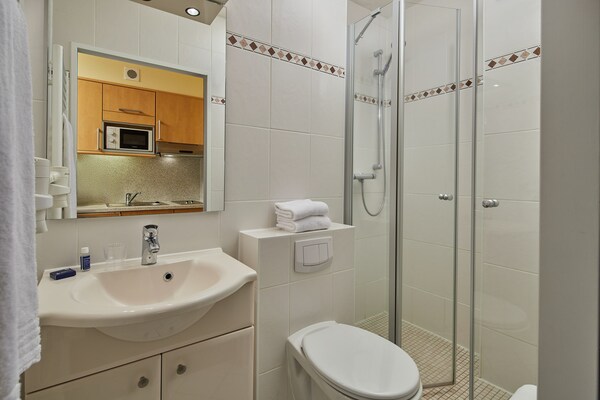 Foto van Appartementen in het recreatiepark Weissenhäuser Strand - BathRoom