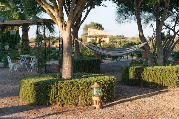 Foto van Villa in Manacor met zwembad en uitzicht - Vakantiehuis in Manacor, Illes Balears - GardenSummer