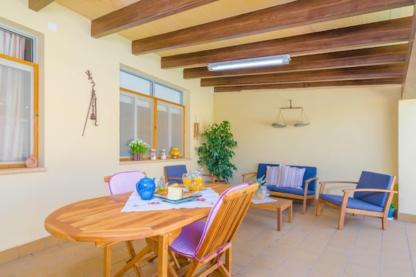 Foto van Charmante villa met zwembad - Vakantiehuis in Ariany, Illes Balears - TerraceBalcony