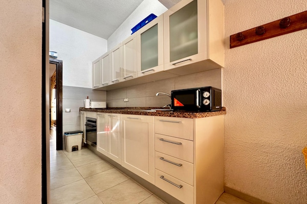Foto van Appartement in Roquetas de Mar met terras - Vakantiehuis in Roquetas de Mar - Kitchen