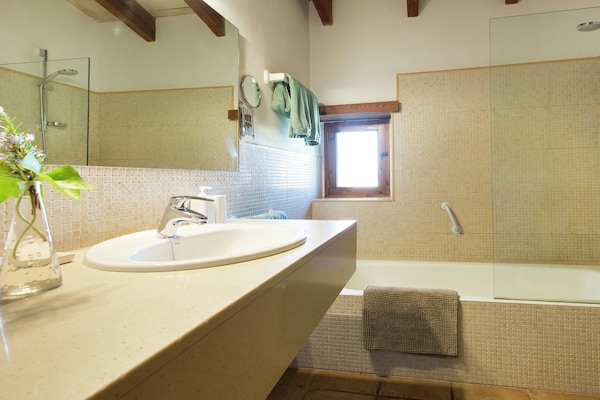 Foto van Rijtjeshuis op Mallorca met zwembad - Vakantiehuis in Lloret de Vistalegre - BathRoom