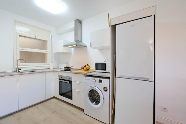 Foto van Appartement in Spanje bij Zandstrand - Vakantiehuis in Calella de Palafrugell, Llafranc - Kitchen