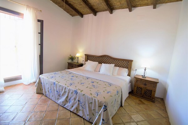 Foto van Cottage in Antequera met zwembad bij El Torcal - Vakantiehuis in Antequera Los Nogales - BedRoom