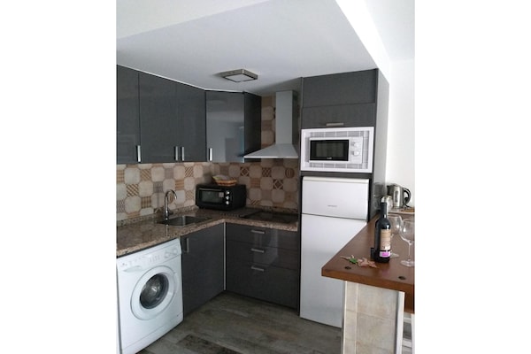 Foto van Appartement aan het strand met terras - Vakantiehuis in Benalmádena - Kitchen