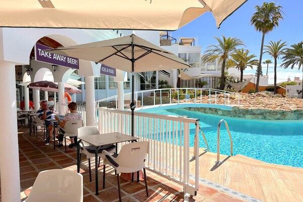 Foto van Appartement in Nerja met Zeezicht & Zwembad - Vakantiehuis in Nerja - TerraceBalcony