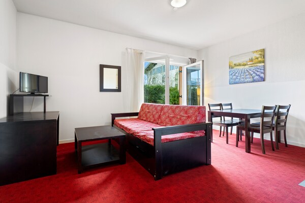 Foto van Appartement voor vier met toegang het zwembad - Vakantiehuis in Grasse - LivingRoom