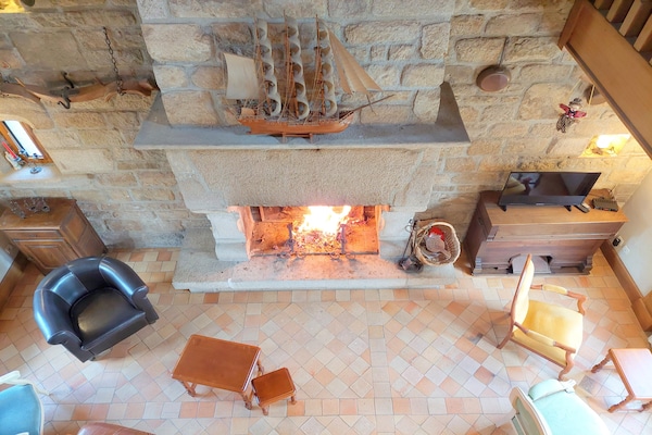 Foto van Granieten Huis in Bretagne met Zeezicht - Vakantiehuis in St. Pol-de-Léon - LivingRoom