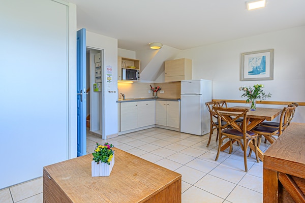 Foto van Bretagne Flat, strand en zwembad - Vakantiehuis in St Nic - Kitchen