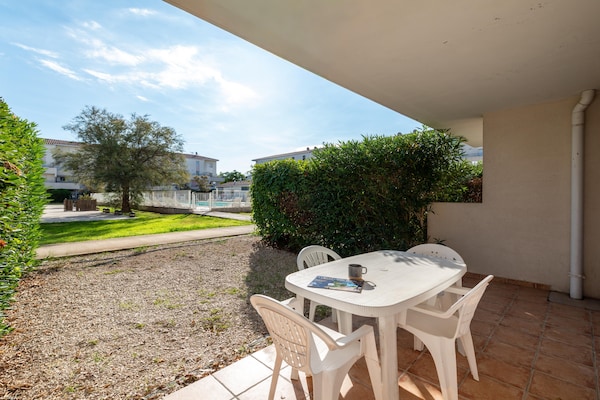 Foto van Appartement met uitzicht op het zwembad bij de Franse jachthaven - TerraceBalcony